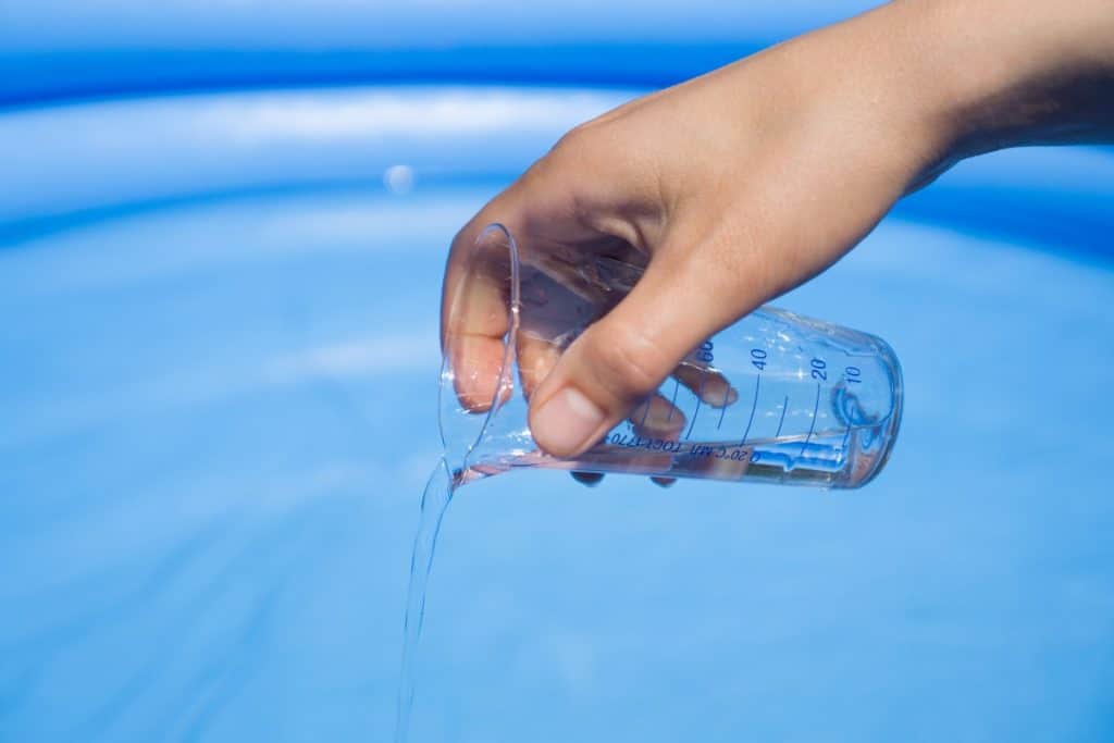 pool shock turns water green